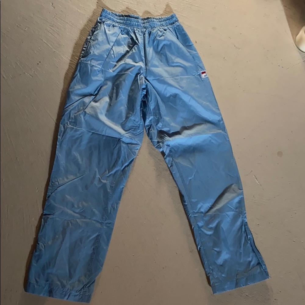 Blue Fila splash pants.